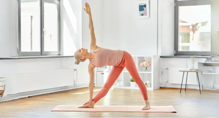 Triangle Pose: Stretch and Strengthen Your Legs and Back | The Output by  Peloton